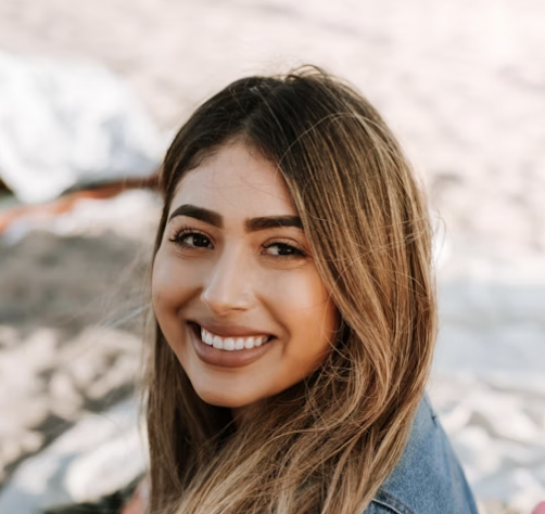 Smiling brunette woman outdoor portrait