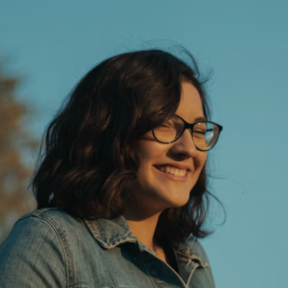 Smiling woman glasses outdoor portrait